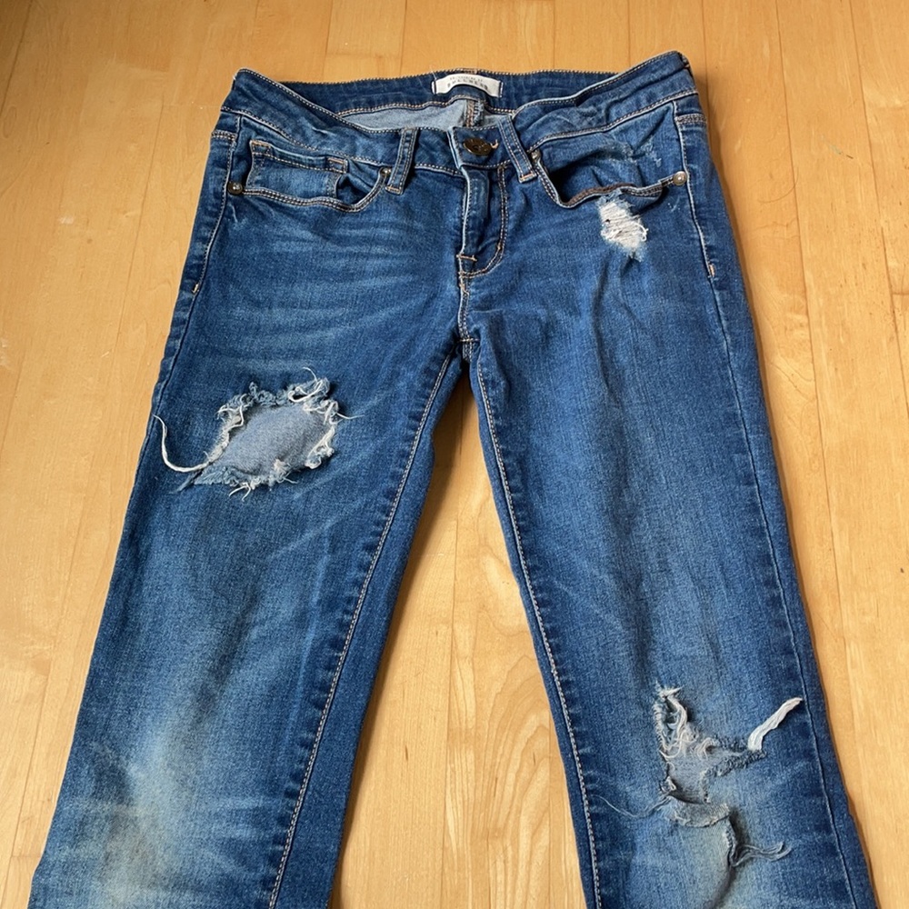Slim boot ripped blue jeans